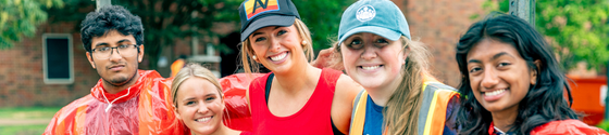 Several students smiling